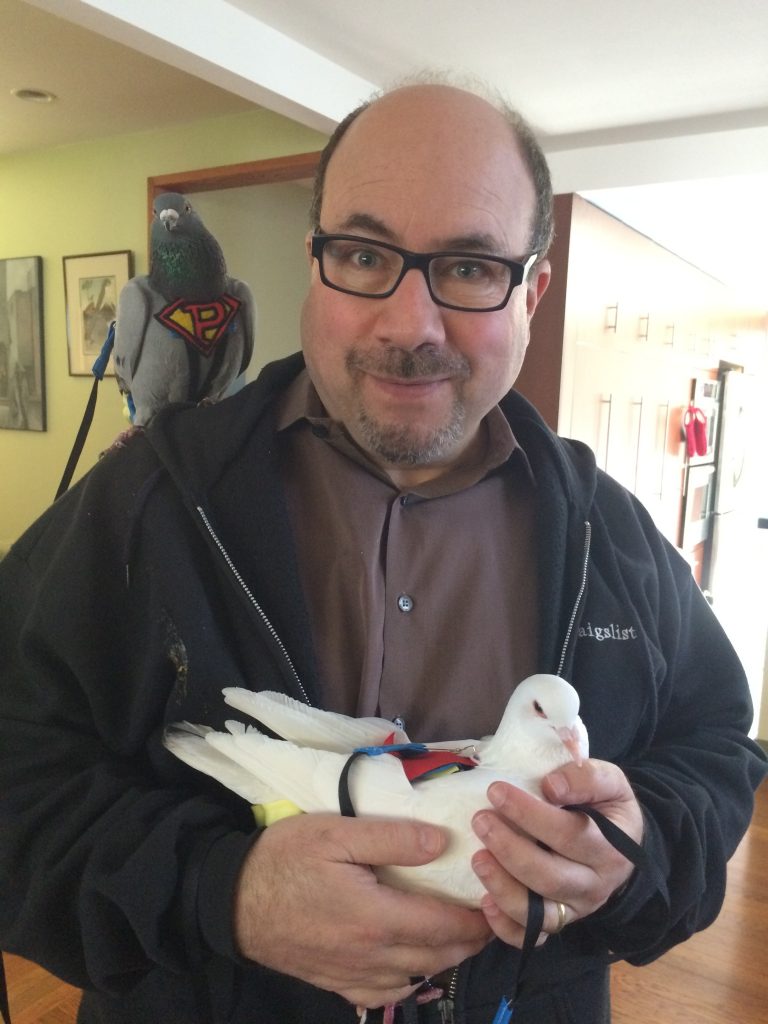 Craig Newmark with rescued pigeons