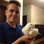 James rescued king pigeon Snow from the streets of San Francisco
