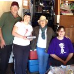 MickaCoo volunteers at a Garage Sale benefit